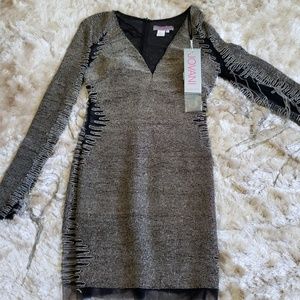 One of a kind! Mesh peekaboo sides, arms.